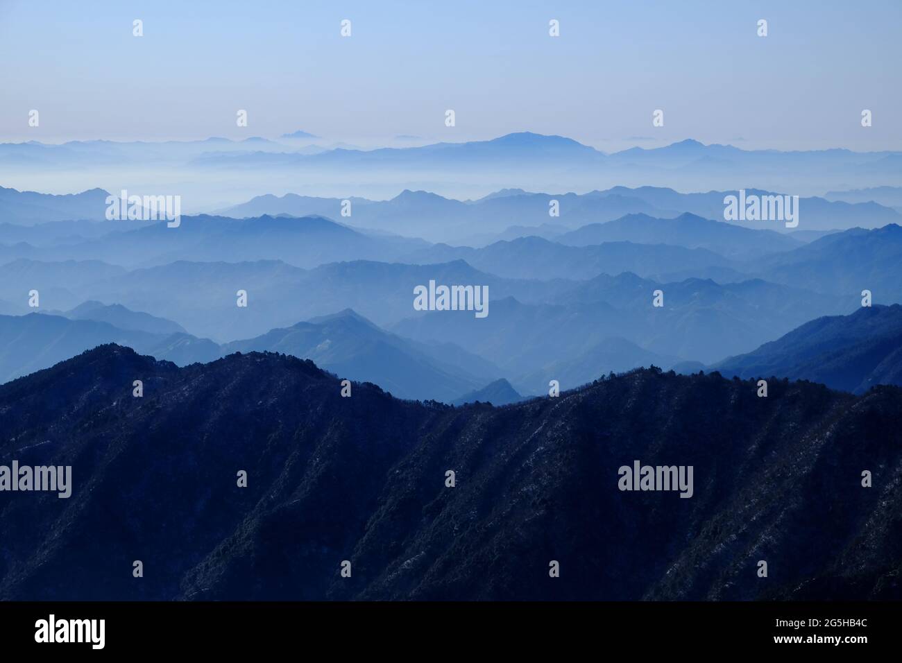Mountain peaks rise one upon another in Mountain Huangshan (Yellow Mountain), Anhui, China. Stock Photo