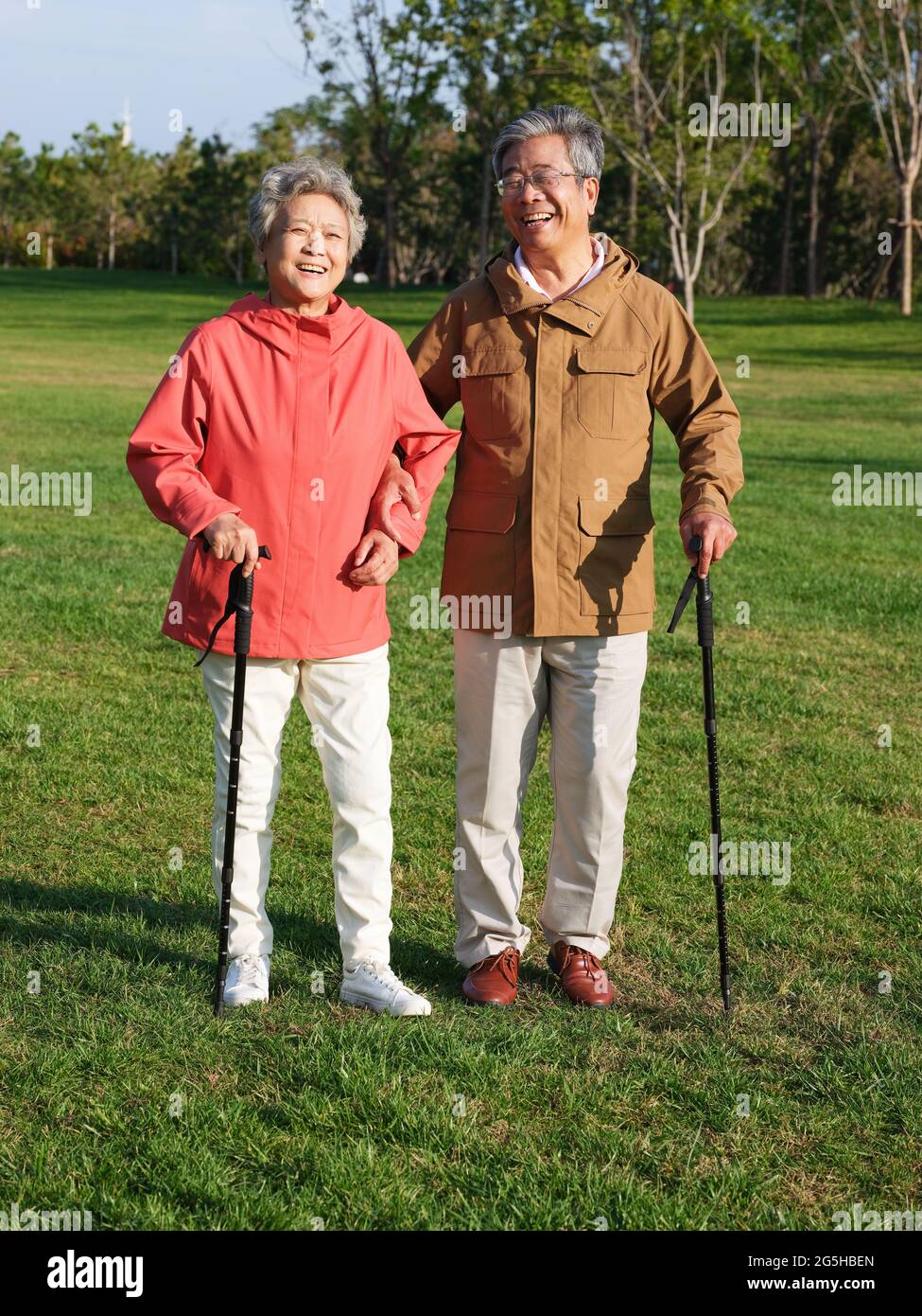 Happy old couple walking in the park high quality photo Stock Photo
