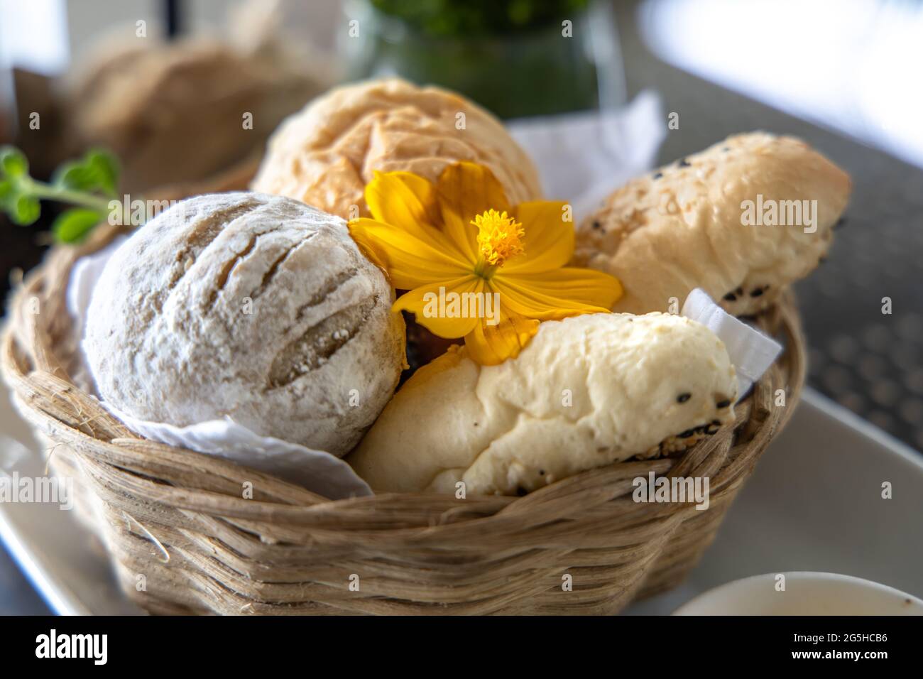Various breads in the basket at Restaurant Stock Photo