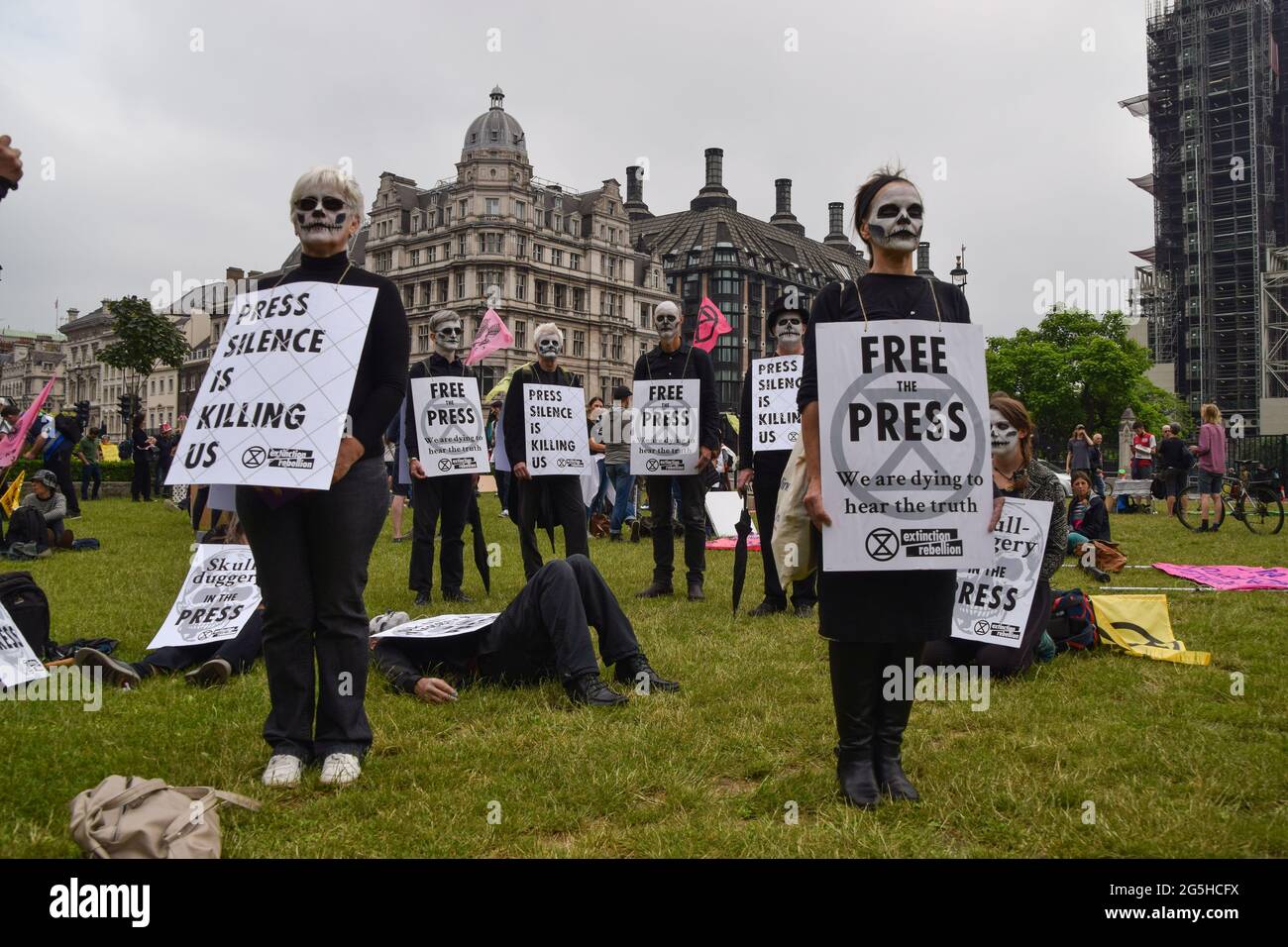 Press Protest Demonstrators wearing costumes hold placards during the Free The Press ...