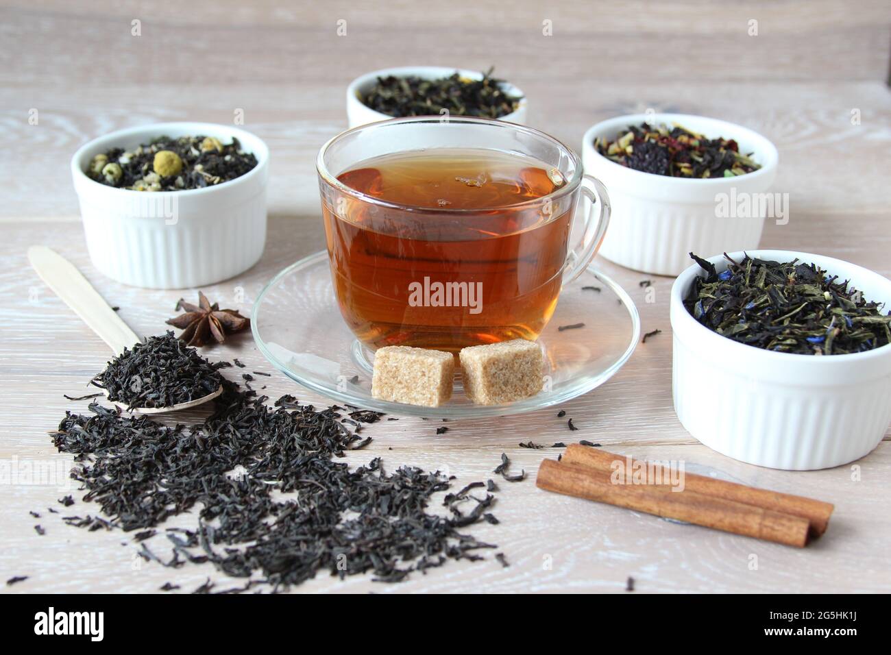 Tea assortment. Various kinds of tea in bowl on the wooden rustic ...