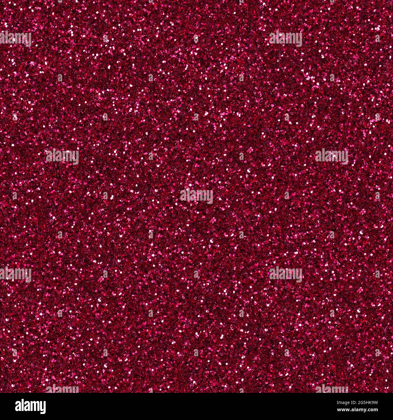 Red glitter, sparkle confetti texture. Xmas wallpaper. Christmas