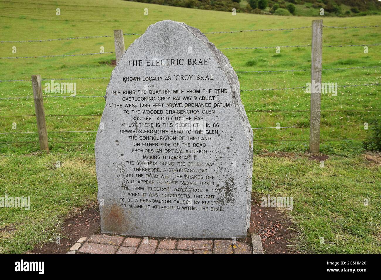 Ayrshire, Scotland, UK - June 26 2021: Old stone sign for The Electric Brae, a famous optical illusion. Stock Photo