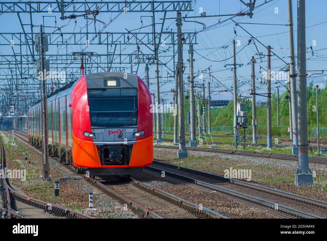 LENINGRAD REGION, RUSSIA - MAY 24, 2021: Electric train ES2GP-006 'Lastochka' in motion. Front view Stock Photo