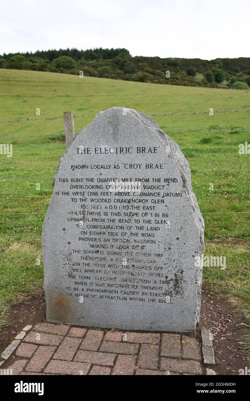 Ayrshire, Scotland, UK - June 26 2021: Old stone sign for The Electric Brae, a famous optical illusion. Stock Photo