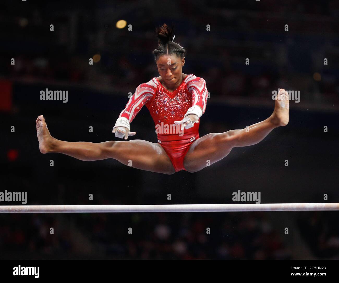 St Louis, USA. June 27, 2021 Simone Biles performs on the uneven parallel bars during Day 2 of