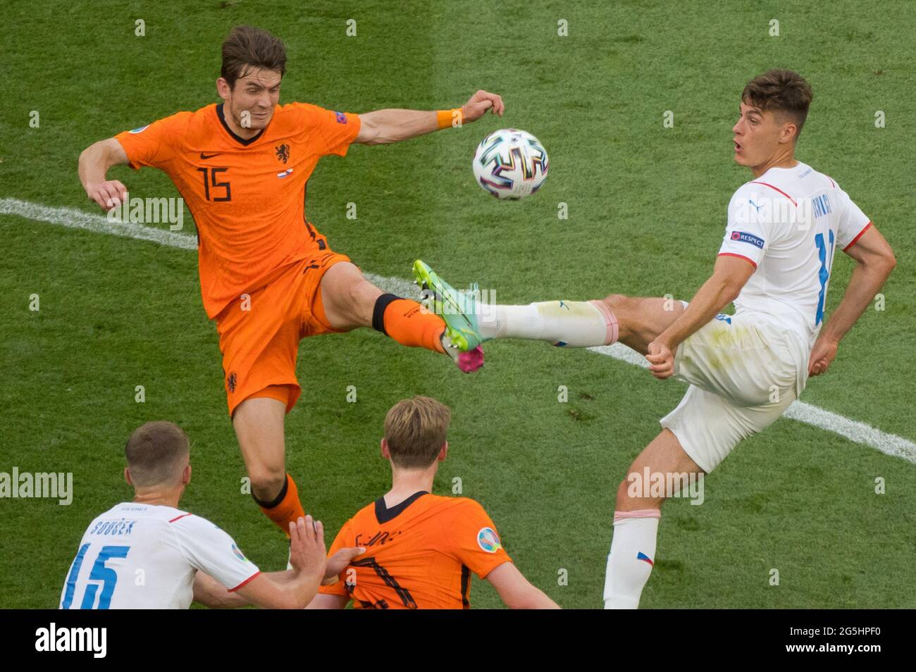 Budapest, Hungary. 27th June, 2021. The Czech Republic's Tomas Soucek (top R) vies with Netherlands' Marten de Roon (top L) during the UEFA Euro 2020 Championship Round of 16 match between the Czech Republic and Netherlands in Budapest, Hungary, on June 27, 2021. Credit: Attila Volgyi/Xinhua/Alamy Live News Stock Photo