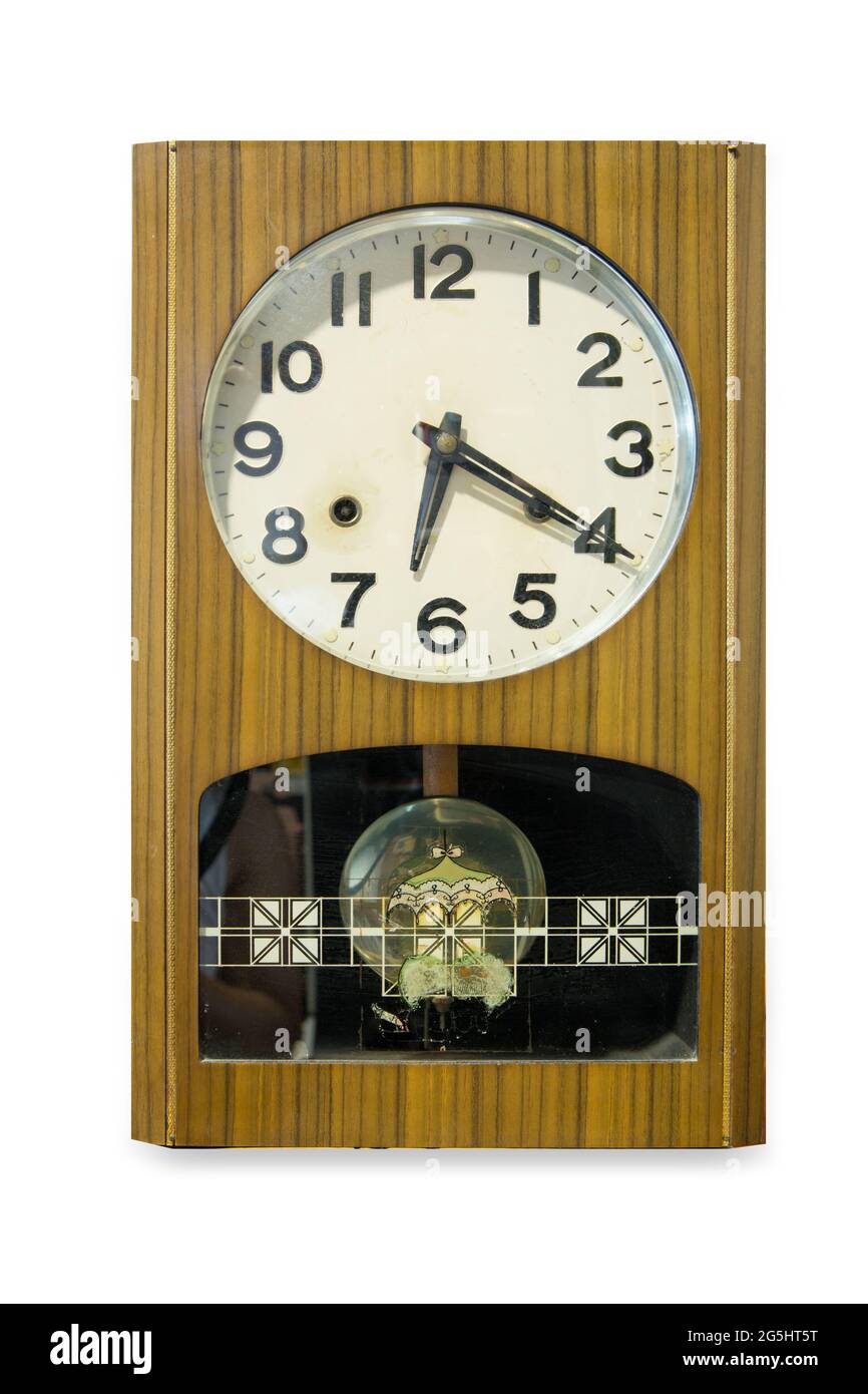 Front view of Antique wall clock isolated on white background. Stock Photo