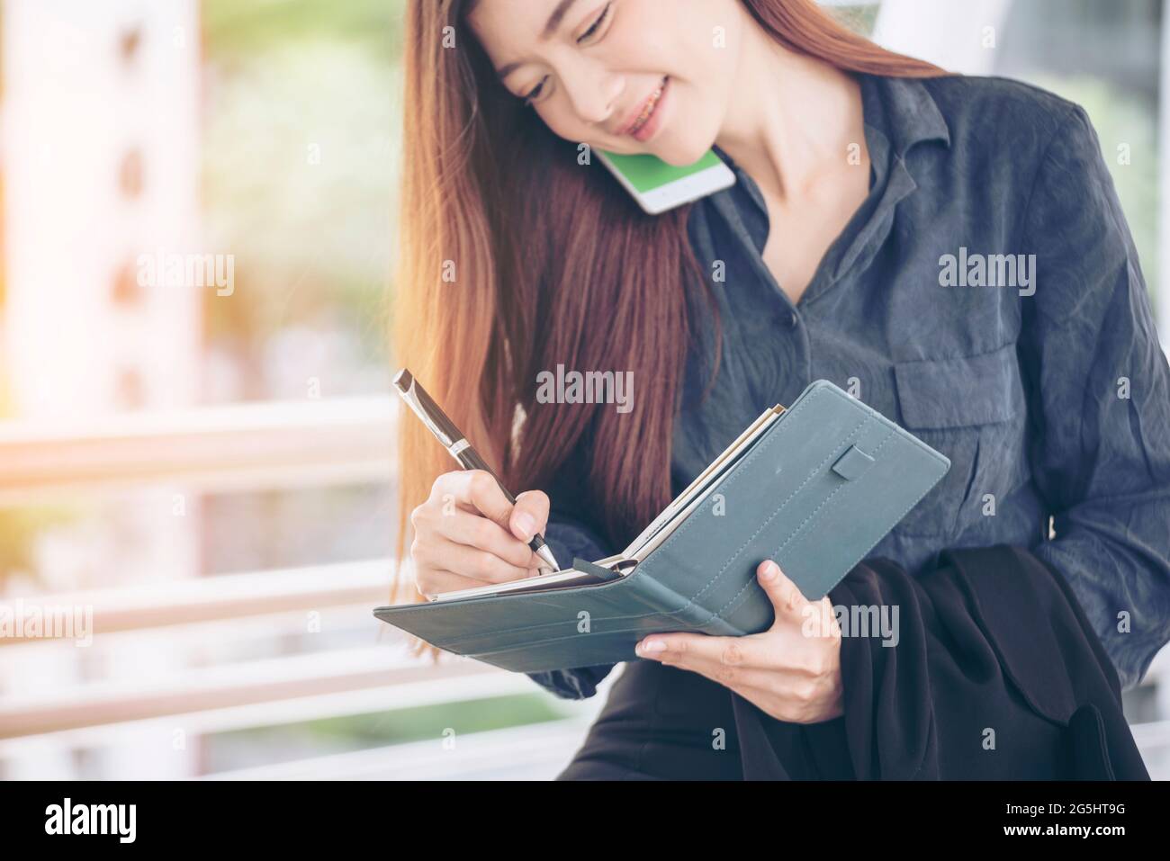 Agenda of planner woman schedule and organize appointment 2019 Calendar Event. Smart Business woman note and schedule to set timetable organize schedu Stock Photo