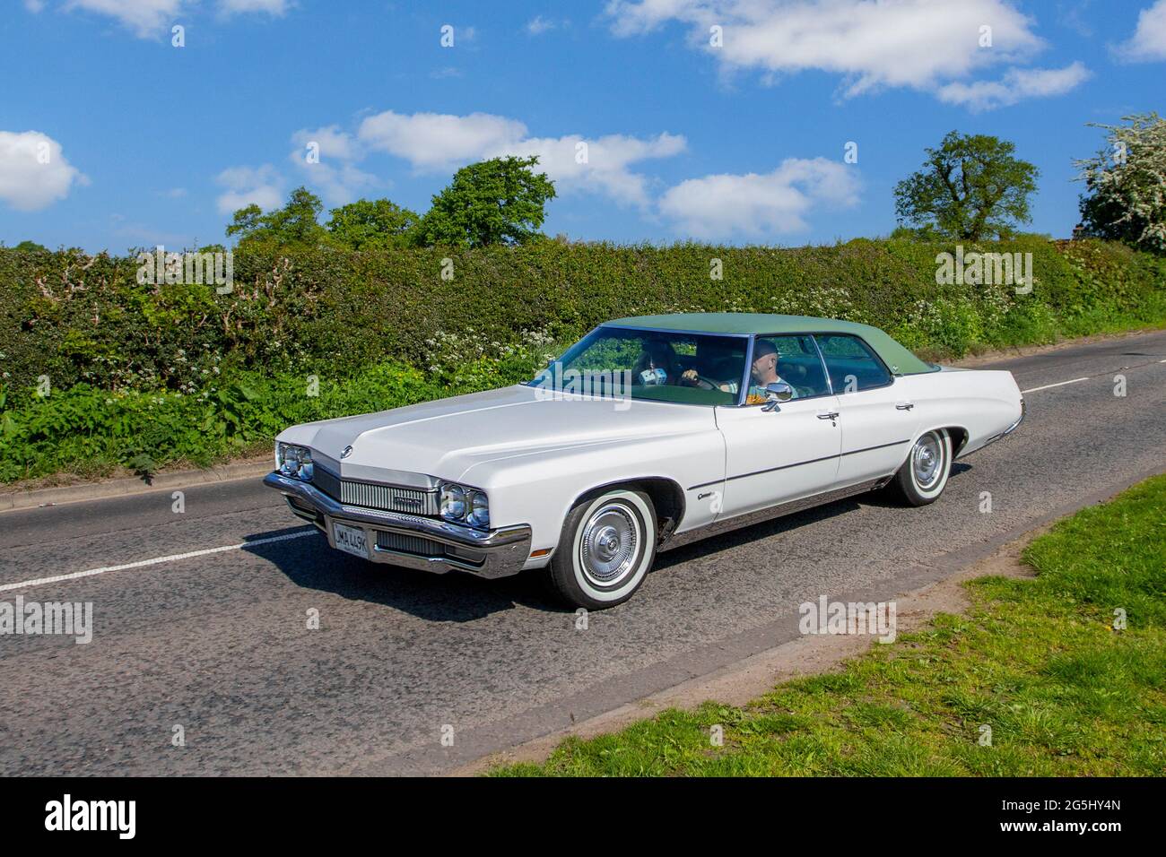 1972 70s Buick Rivera 7500cc American 4dr muscle car, en-route to Capesthorne Hall classic May car show, Cheshire, UK Stock Photo