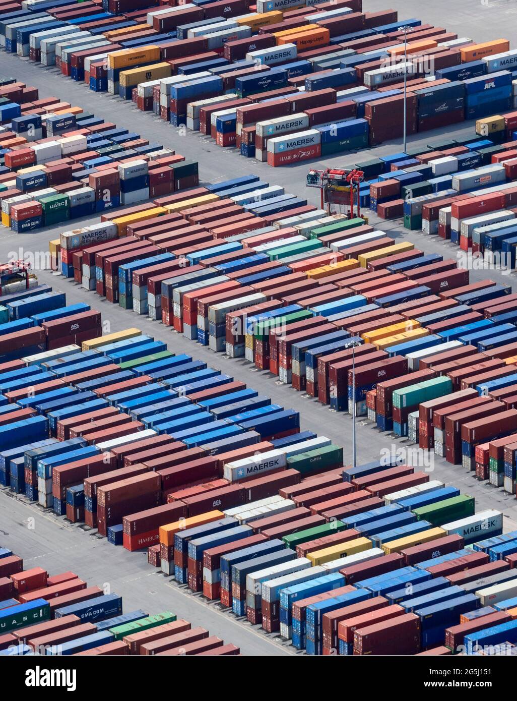 Containers waiting to be loaded onto ships at Seaforth Docks, Port of Liverpool on the River Mersey, north west England, UK Stock Photo