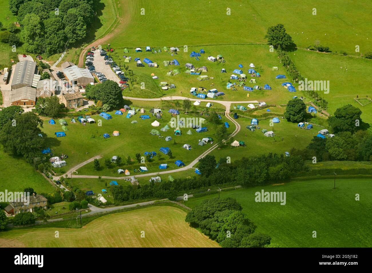 Camping and Glamping at a farm at Bolton Abbey in the Yorkshire Dales, near Skipton, northern England, UK Stock Photo