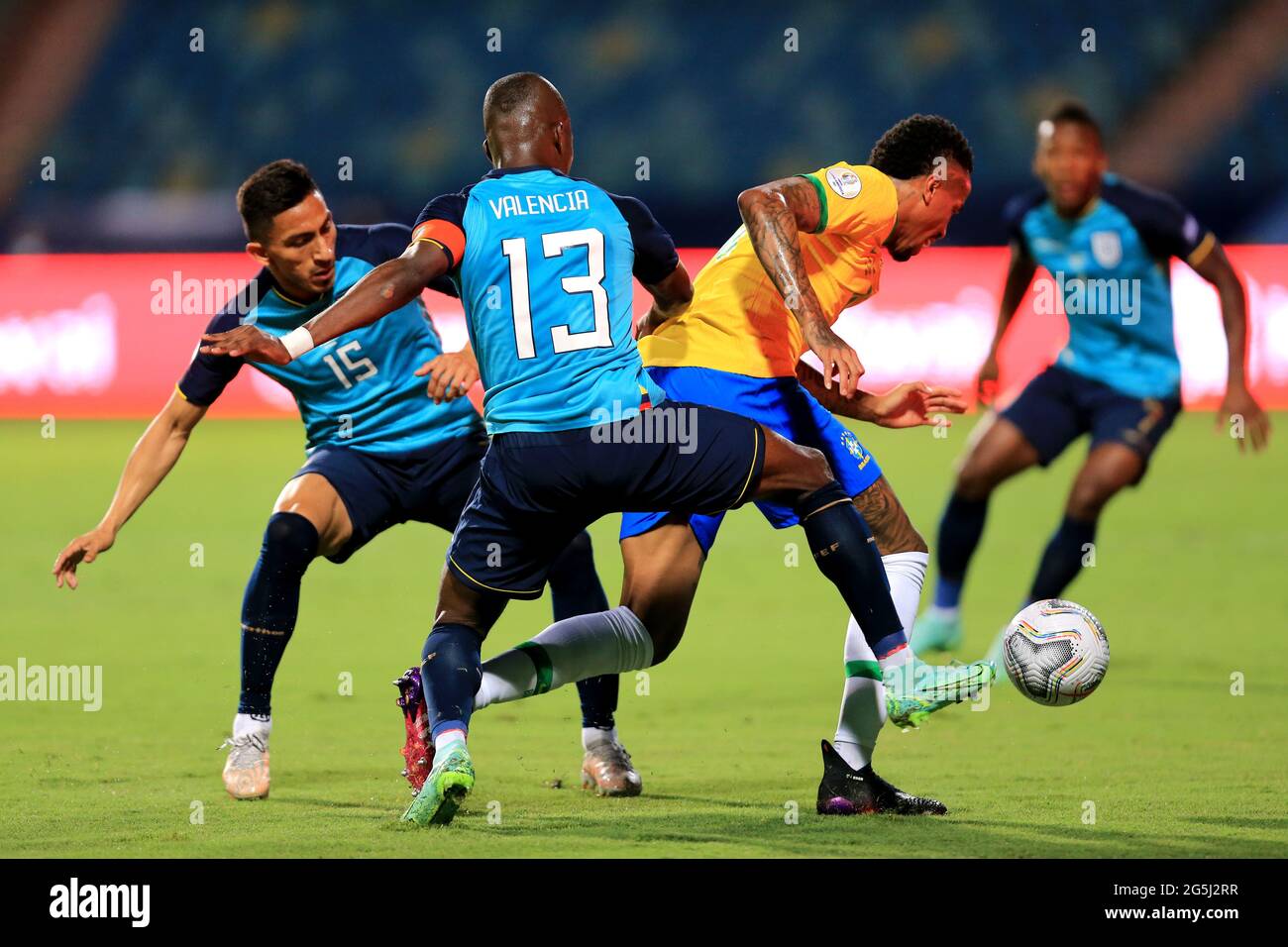 GOIANIA, BRAZIL - JUNE 27: Eder Militao of Brazil competes for the ball with Enner Valencia and Angel Mena of Ecuador ,during the match between Brazil and Ecuador as part of Conmebol Copa America Brazil 2021 at Estadio Olimpico on June 27, 2021 in Goiania, Brazil. (MB Media) Stock Photo