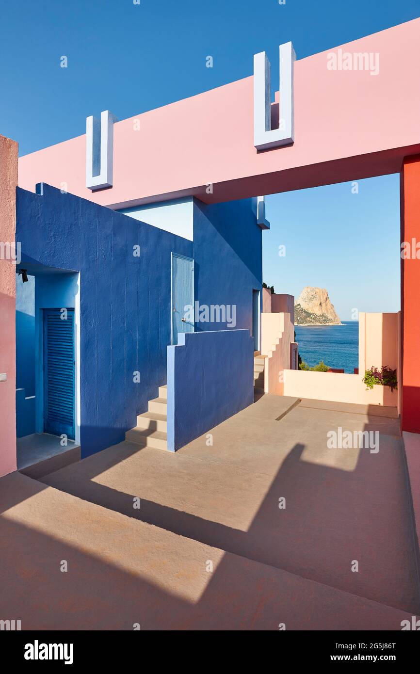 Geometric building design. The red wall, La manzanera. Calpe, Spain Stock Photo