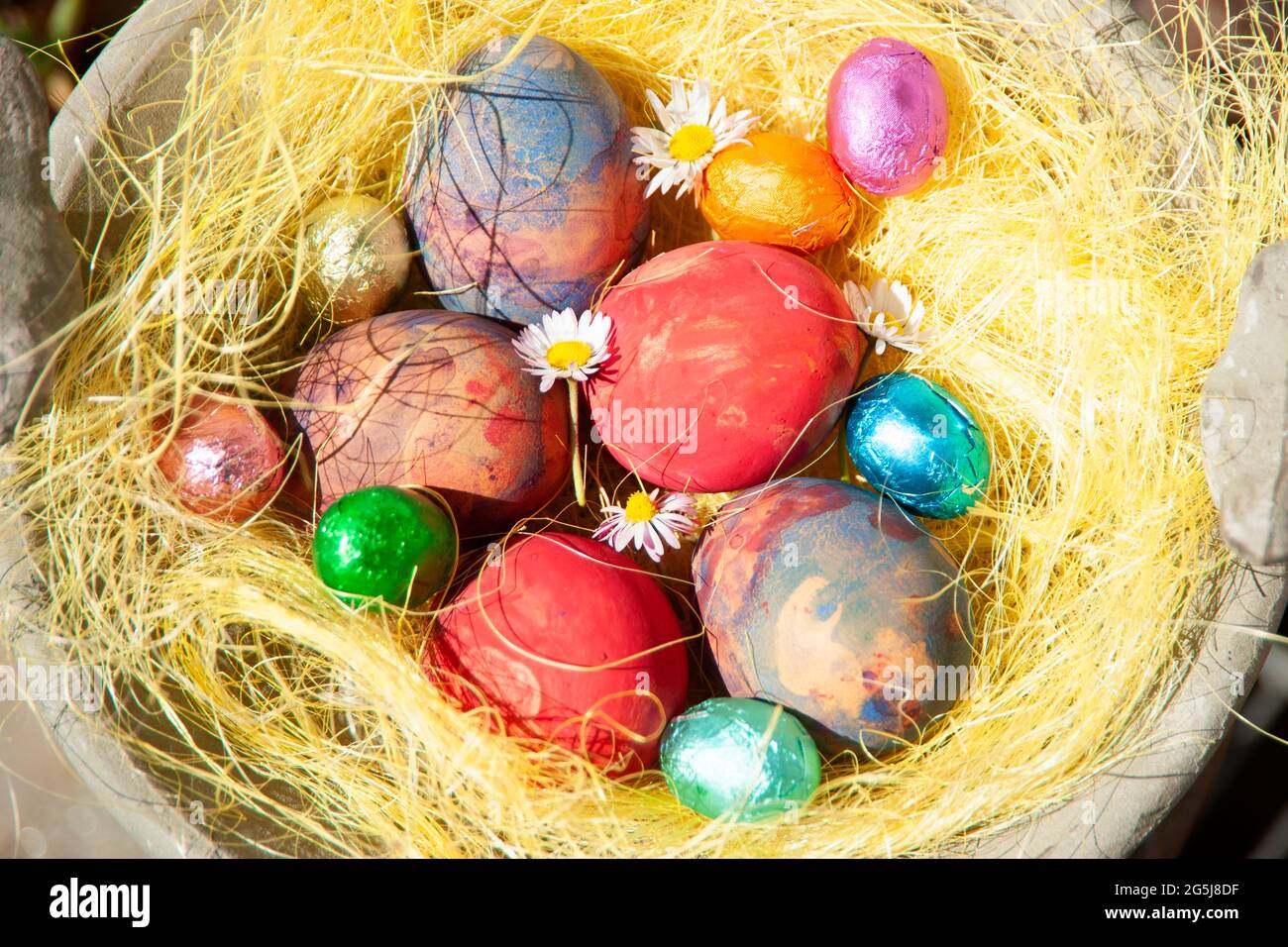 Italy, Turin, Overhead view of colorful chocolate Eater eggs Stock Photo
