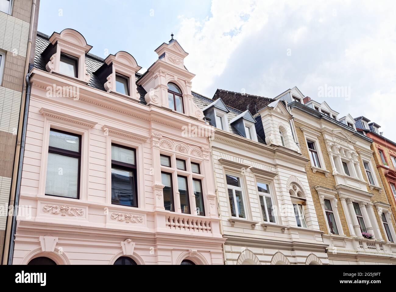 buildings in cologne from the late nineteenth century restored with brilliant colours Stock Photo