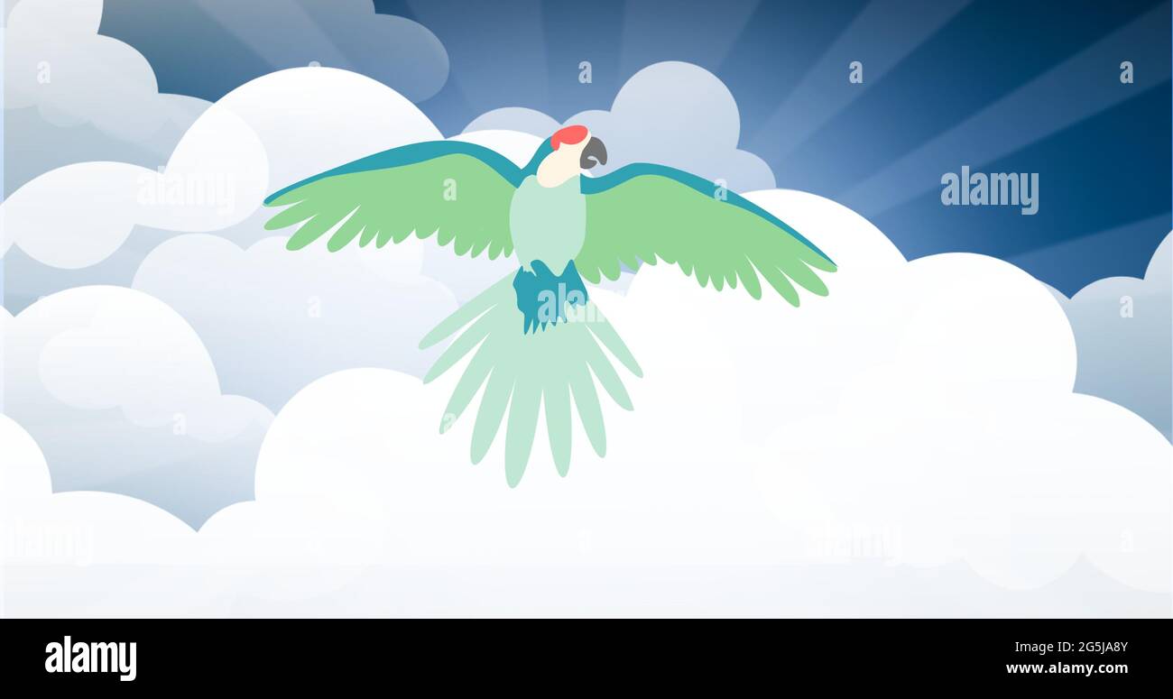 Composition of green bird flying against clouds on blue background Stock Photo