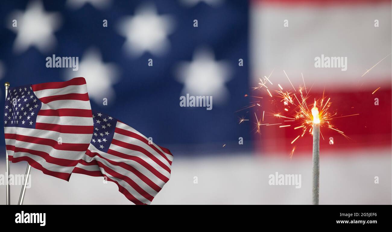 Composition of lit sparkler with american flags Stock Photo - Alamy