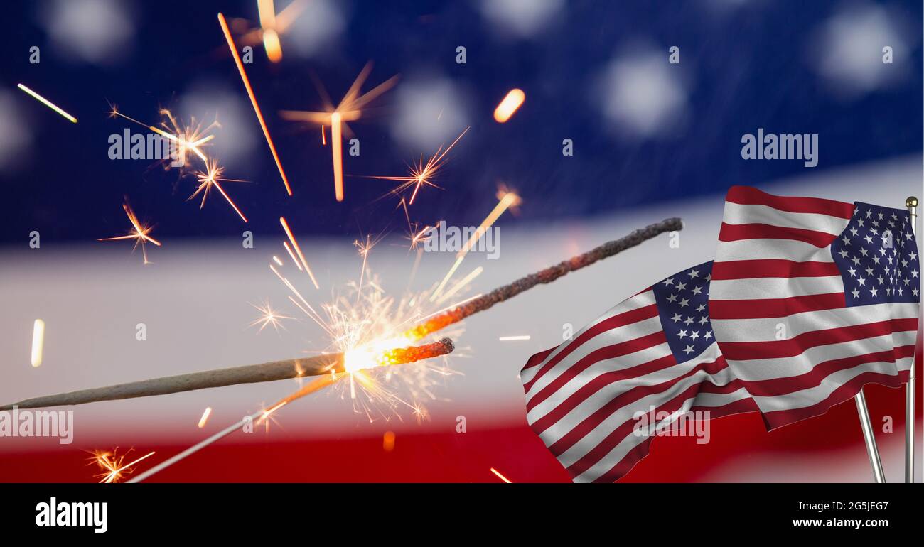 Composition of lit sparklers with american flags Stock Photo - Alamy