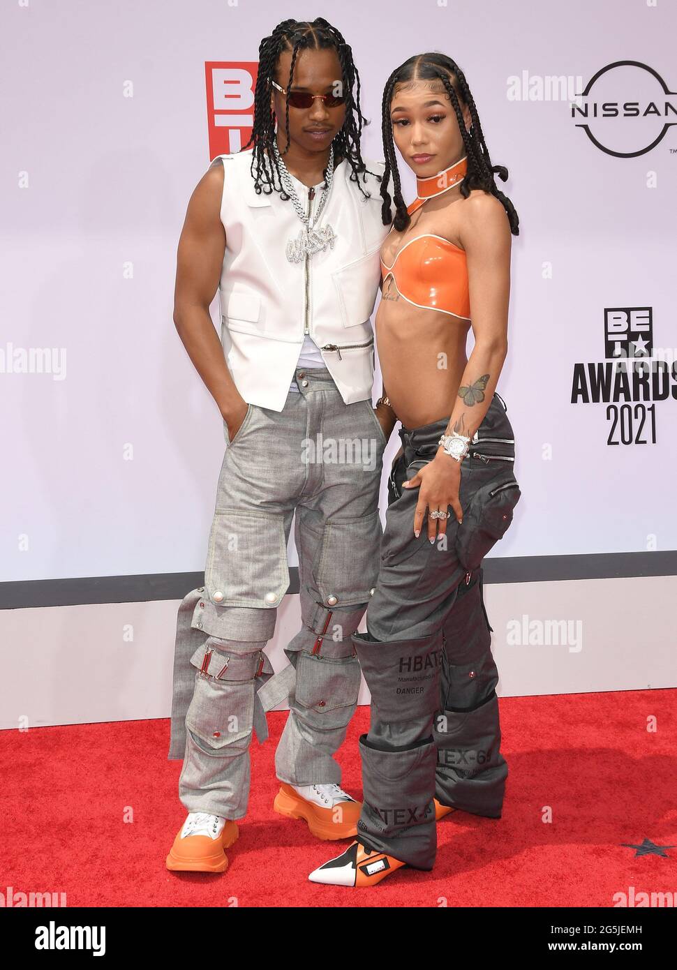 (LR) Pressa and Coi Leray arrives at the BET Awards 2021 held at the