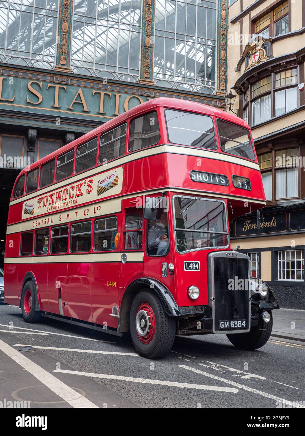 Glasgow, Scotland, UK. 26th June, 2021. Glasgow Vintage Vehicle Trust showcase their collection of vintage buses around the streets of Glasgow as part Stock Photo