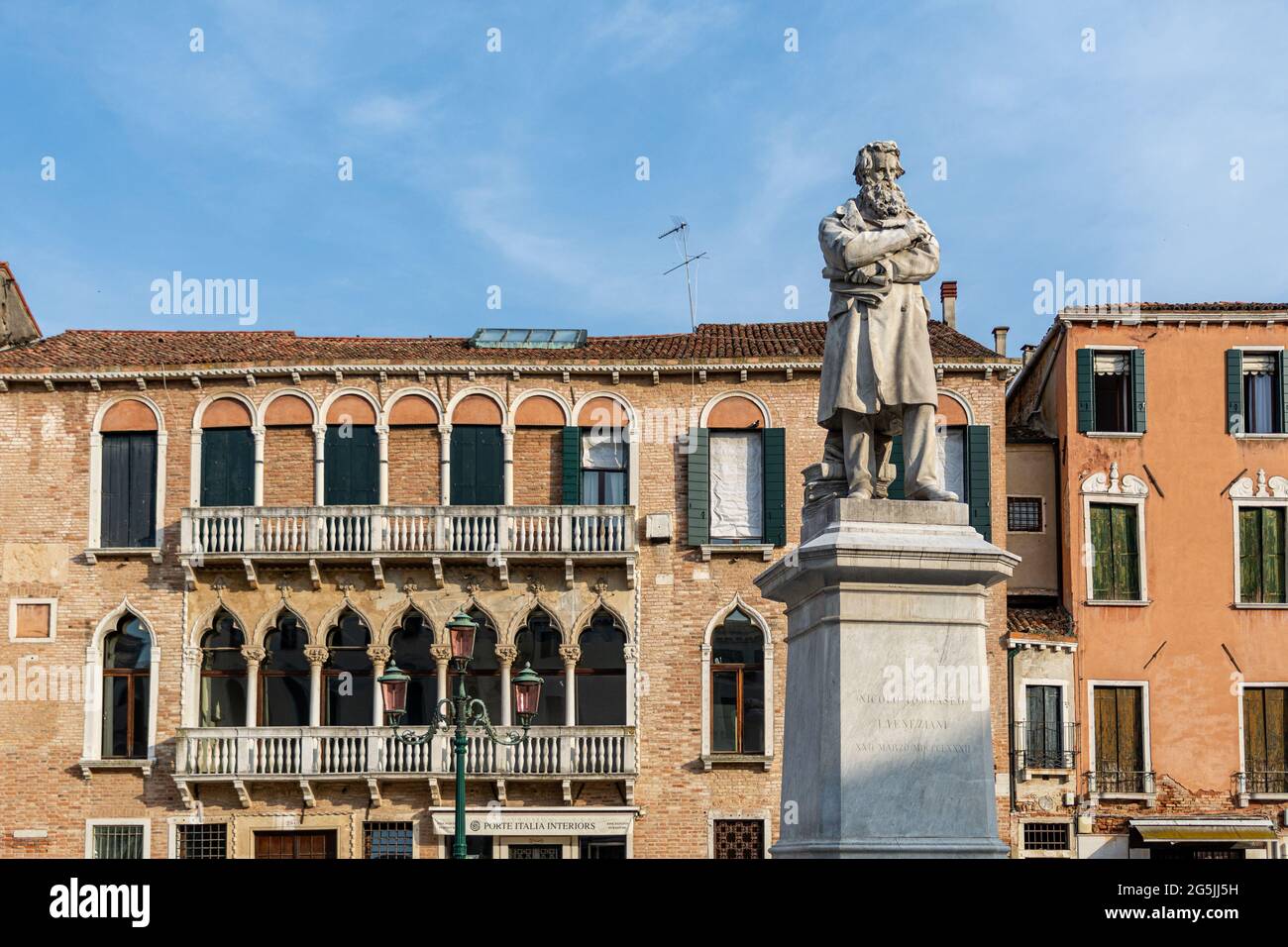 Campo Santo Stefano with historic buildings and the Monument to Niccolò Tommaseo in front Stock Photo