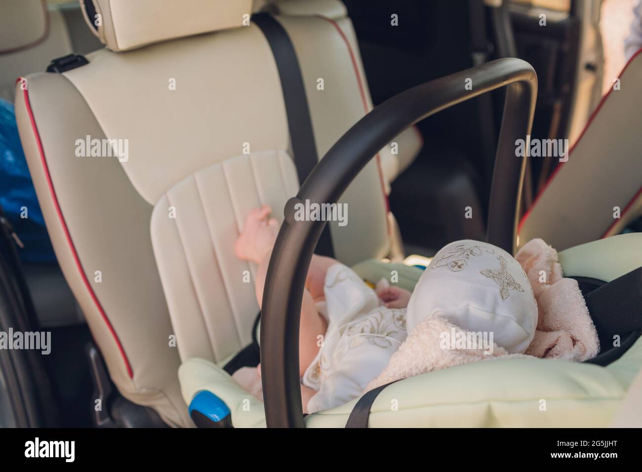 newborn baby sleeping in the car seat Stock Photo Alamy