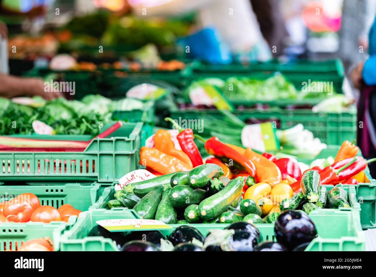 Variety of farmers' fresh vegetables for sale at the market.Blurred