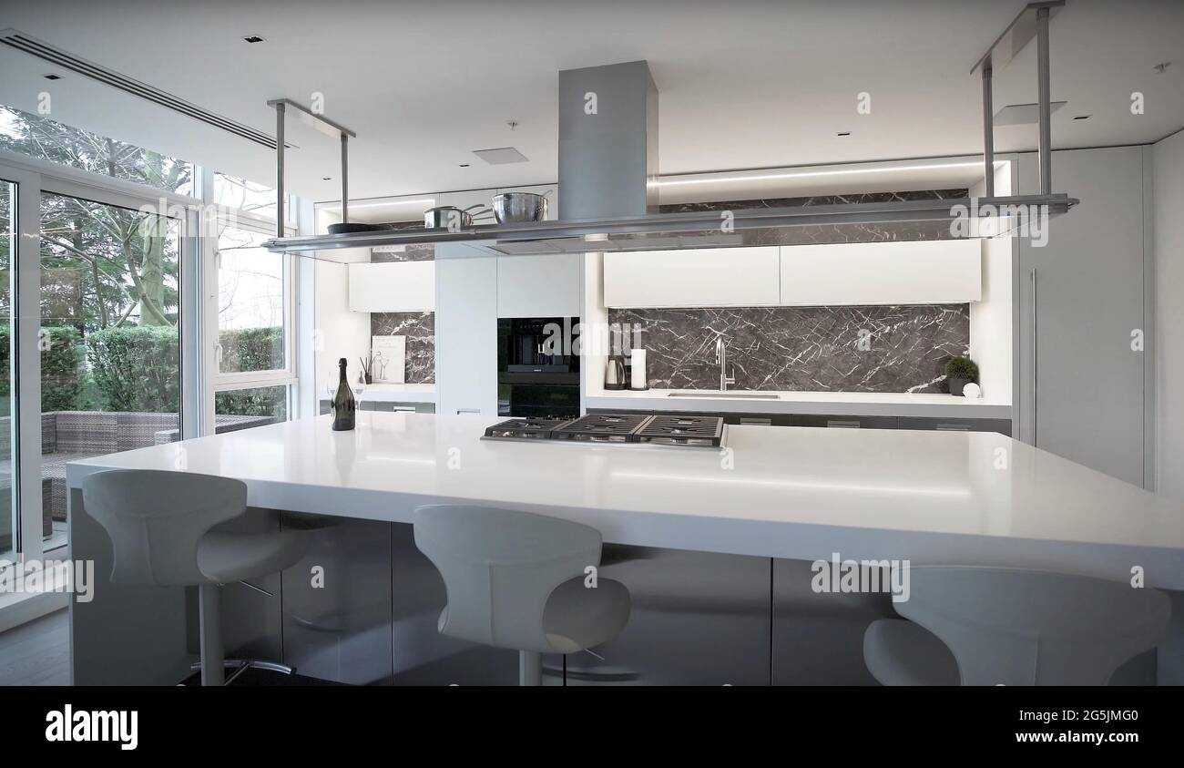 Modern white Kitchen Counter and Kitchen Equipment in Luxurious Apartment.  small kitchen counter ideas in the residential Stock Photo - Alamy