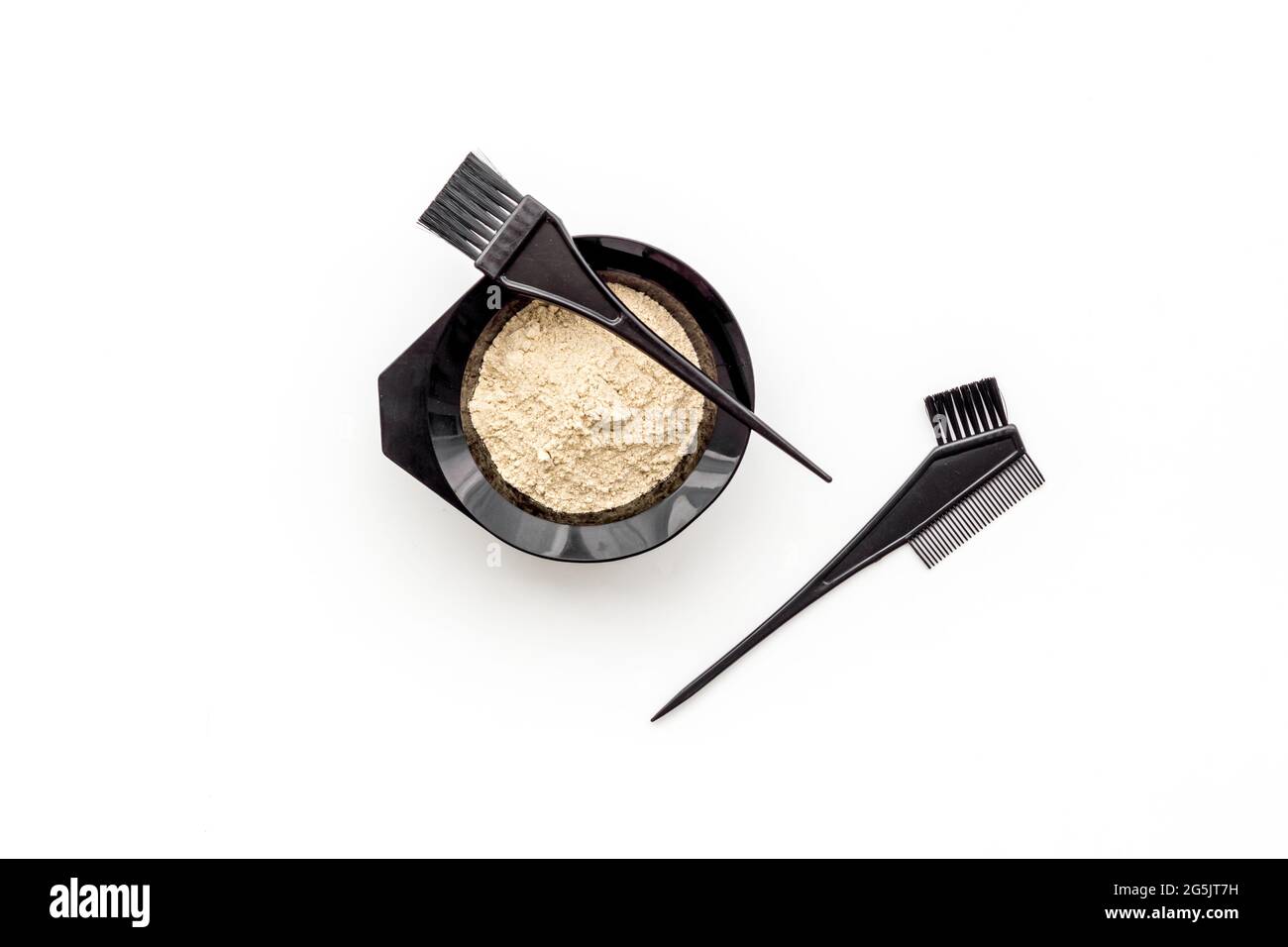 Mixing hair dye in bowl with brush, top view Stock Photo Alamy