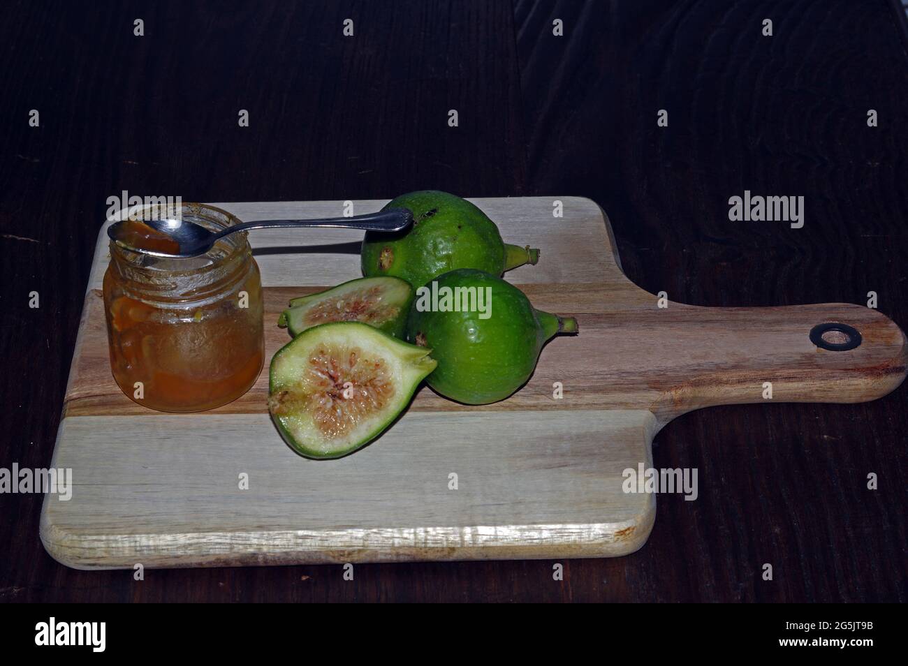 Green figs with fruit jam Stock Photo Alamy