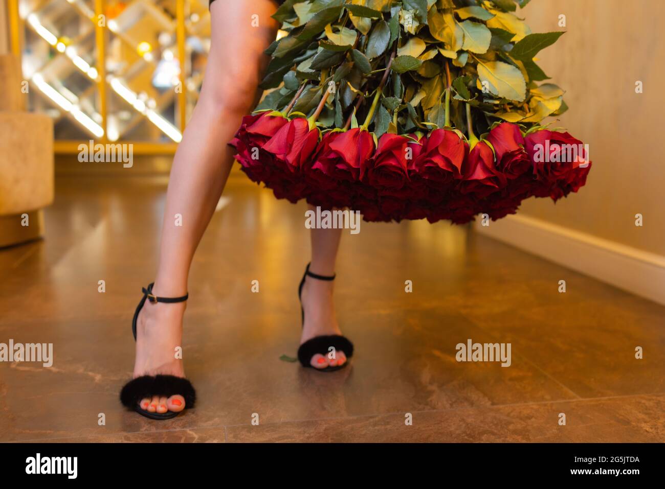 Woman holds luxury bouquet of red roses Stock Photo - Alamy