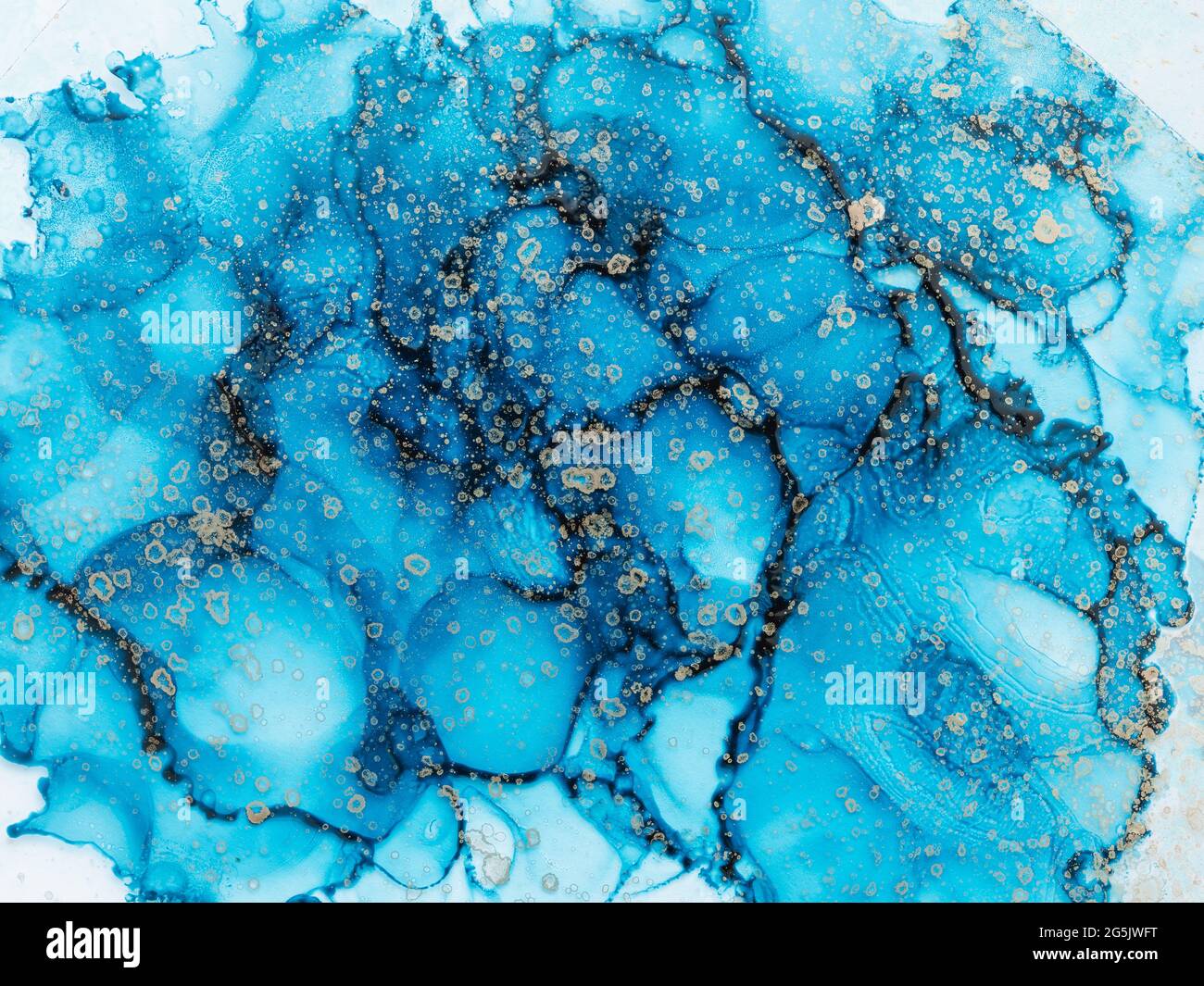 Alcohol ink fluid art. Waves in blue colors with liquid golden inclusion. Abstract marble background or texture Stock Photo