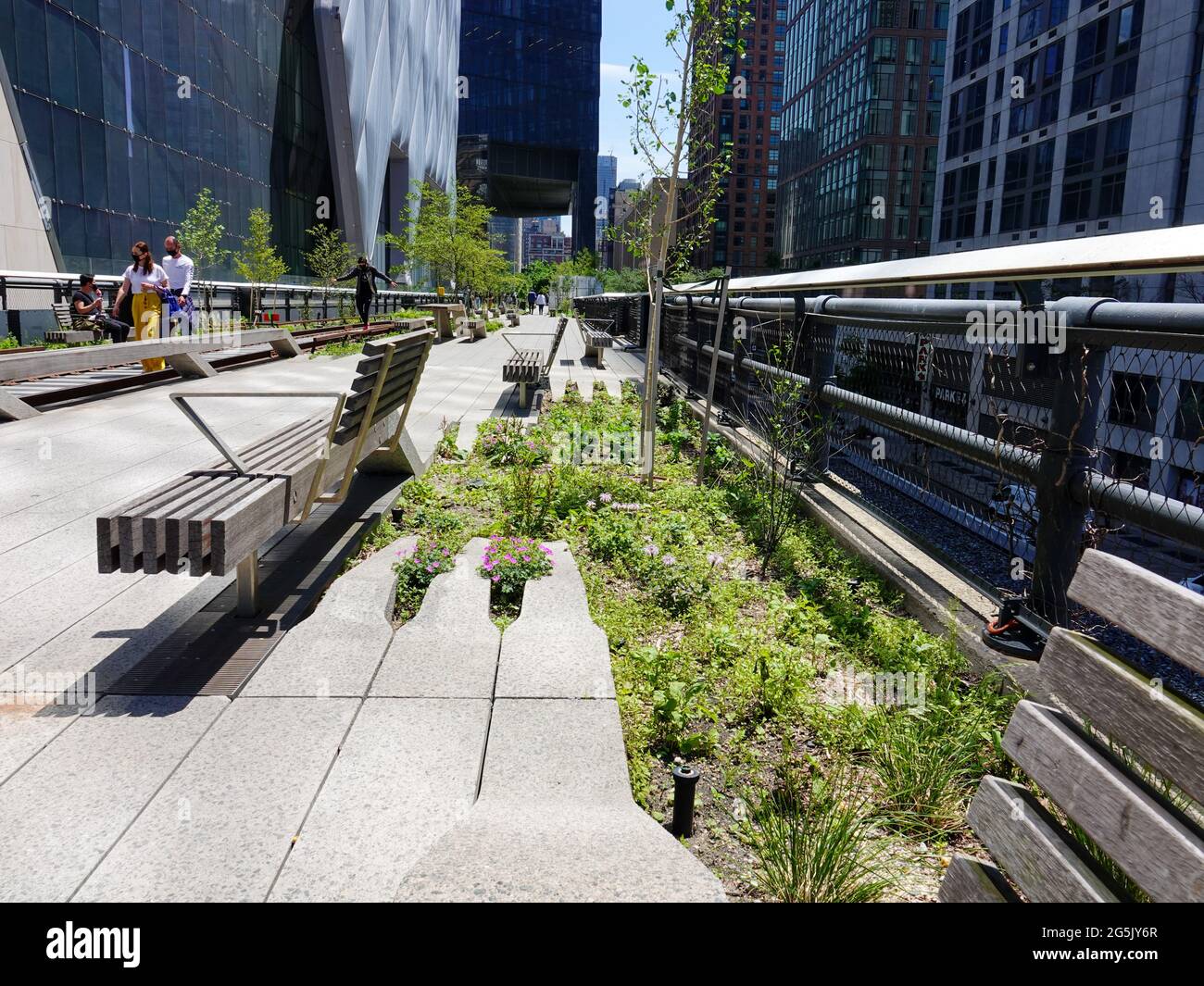 People walking on the High Line linear park in Manhattan, New York, NY