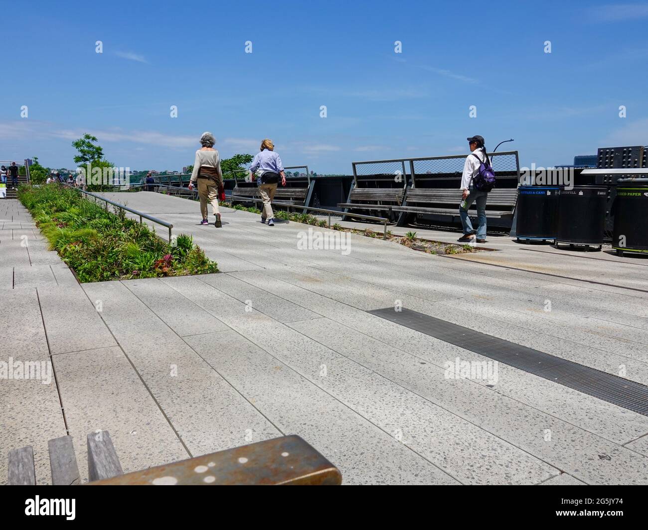 People walking on the High Line linear park in Manhattan, New York, NY