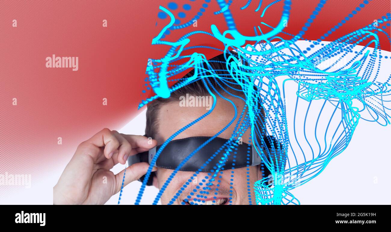 Composition of digital light trails with boy wearing vr headset Stock ...