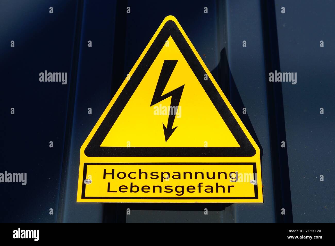 Sign: Attention high voltage! Stock Photo