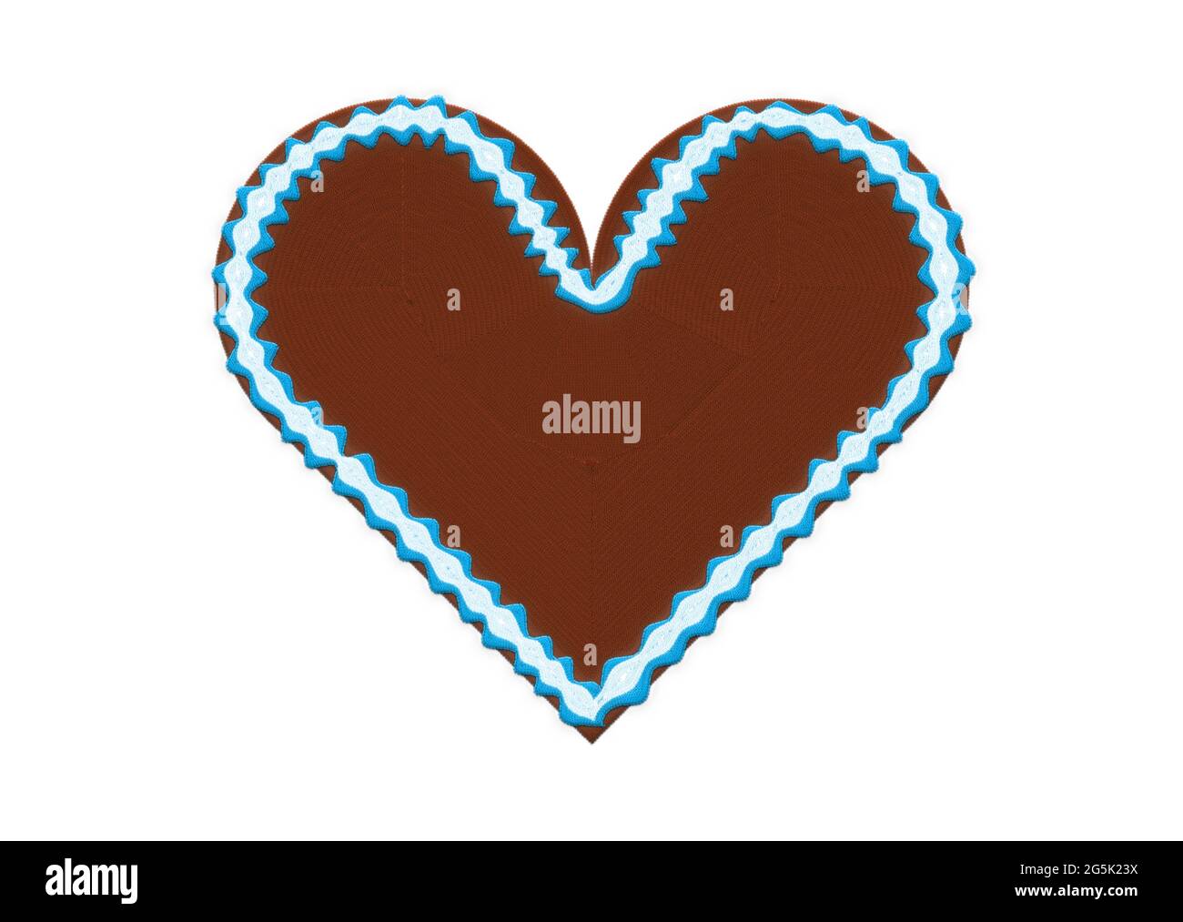 Embroidered gingerbread heart with copyspace Stock Photo