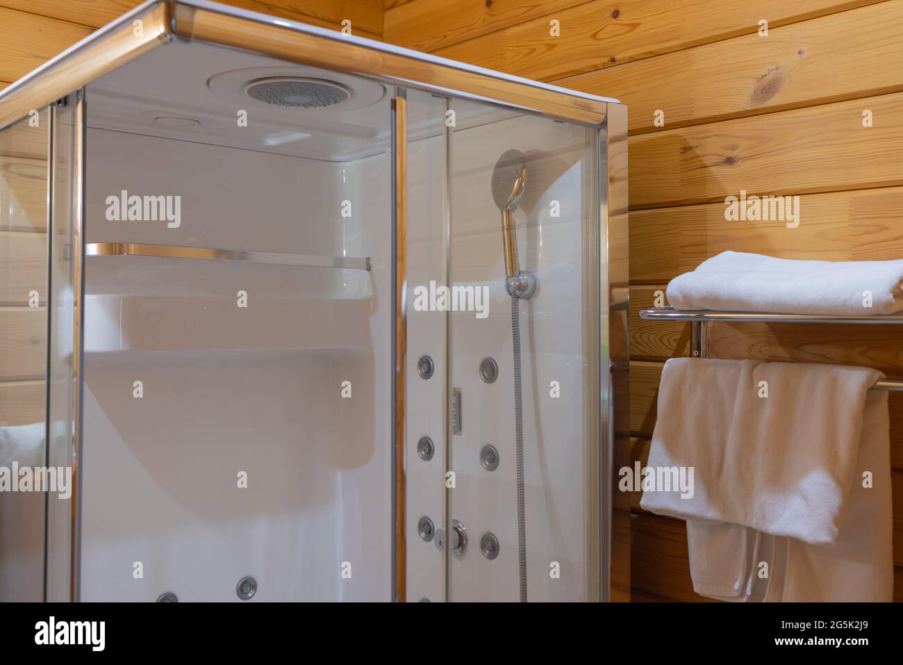 angular shower enclosure with transparent doors Stock Photo - Alamy