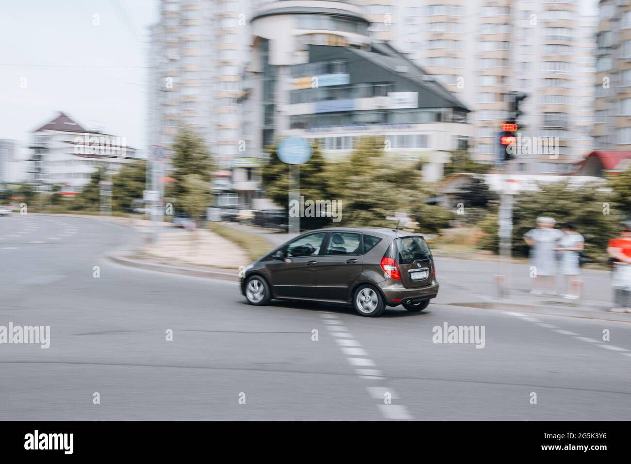 Ukraine, Kyiv - 27 June 2021: Brown Mercedes-Benz A-Class car moving on the street. Editorial Stock Photo