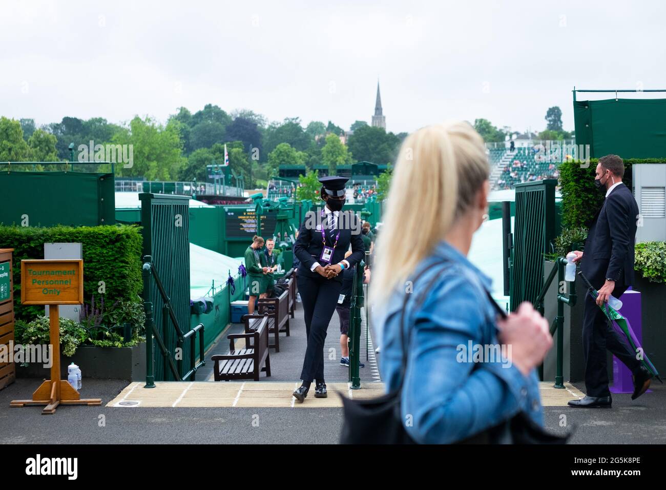 Wimbledon, London, UK. 28th June, 2021. Rain stops play on the outside courts at the All England Club on day one of The Championships 2021, Wimbledon, South West London. Picture date: Monday June 28, 2021. Photo credit should read: Katie Collins/EMPICS/Alamy Credit: Katie Collins/Alamy Live News Stock Photo