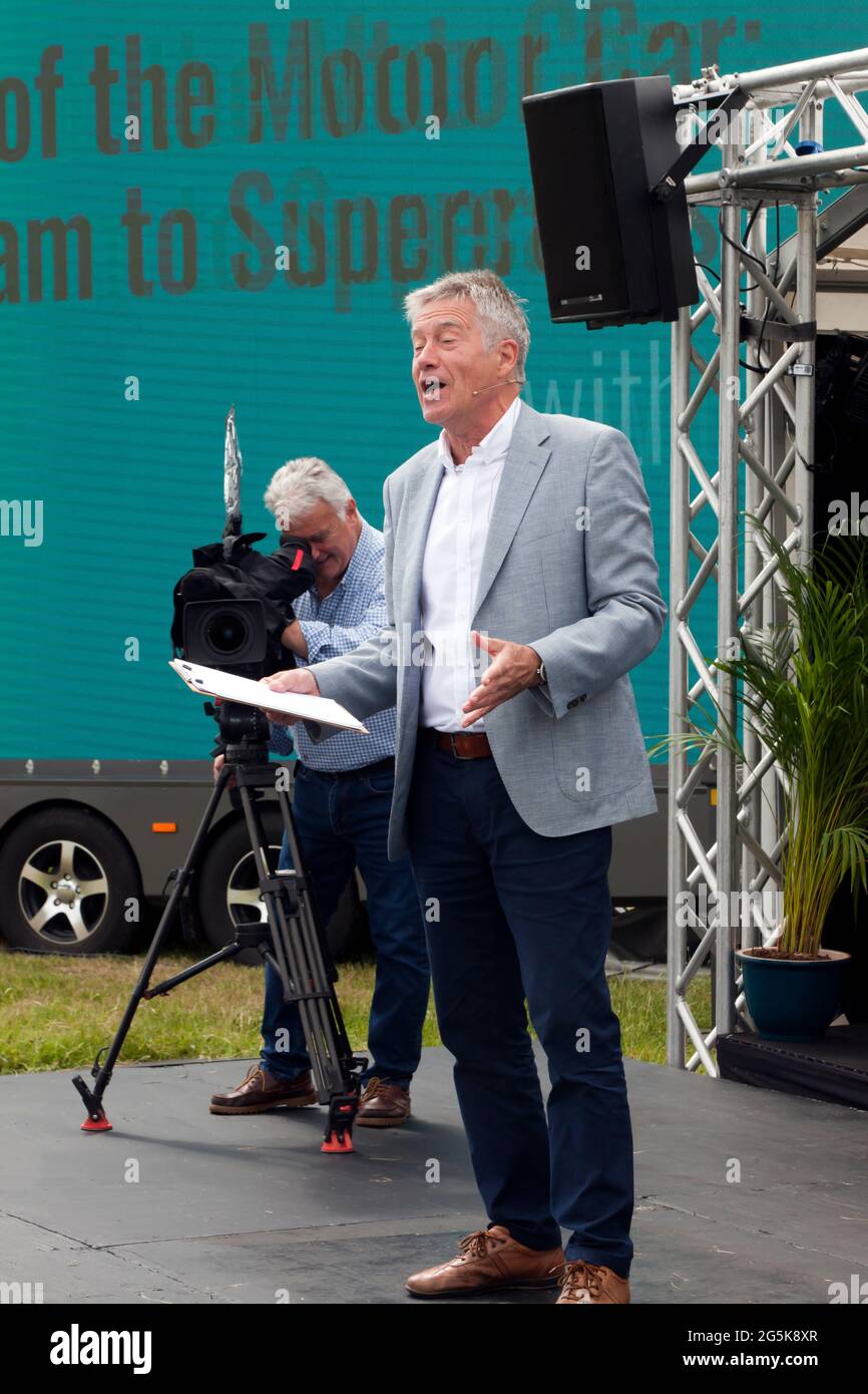Tiff Needell introducing the first talk,  '135 years of the Motor Car, from Steam to Supercars'  at the 2021 London Classic Car Show Stock Photo