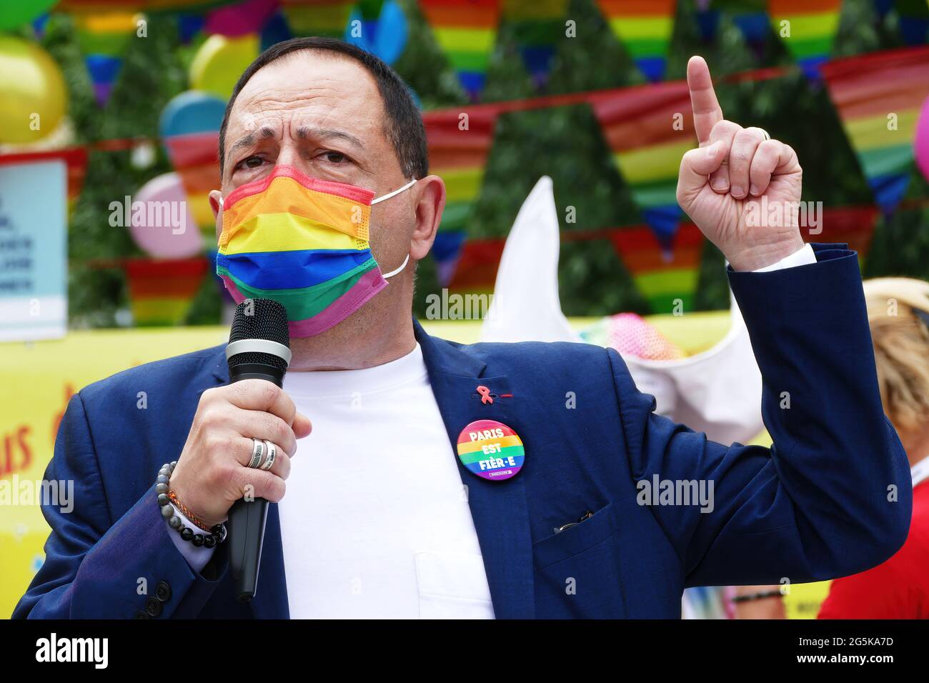 Paris, France. 27th June, 2021. Jean-Luc Romero, Deputy Mayor of Paris in charge of human rights, integration and the fight against discrimination speaks during the Gay Pride March in Paris. Thousands of LGBT members and their supporters took part in the Gay Pride March in Paris to celebrate Pride Month. Credit: SOPA Images Limited/Alamy Live News Stock Photo