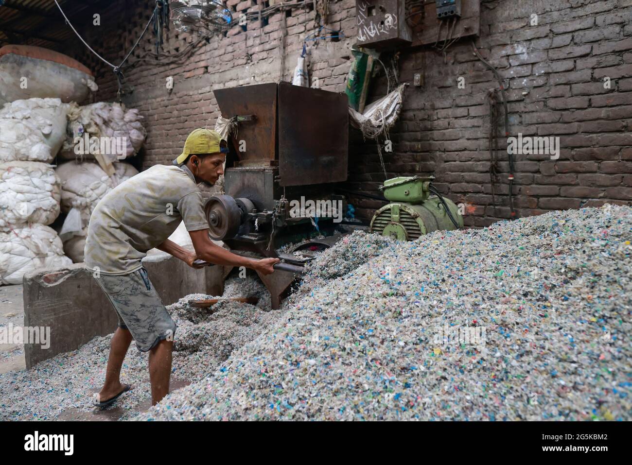 Dhaka, Bangladesh. 28th June, 2021. Bangladeshi workers works at a