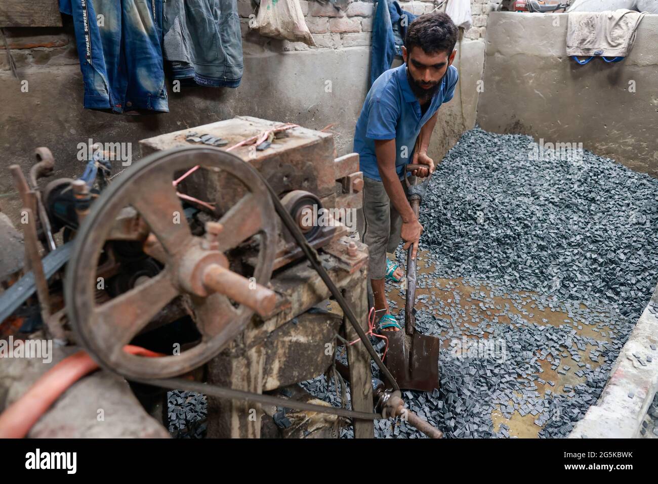 Dhaka, Bangladesh. 28th June, 2021. Bangladeshi workers works at a
