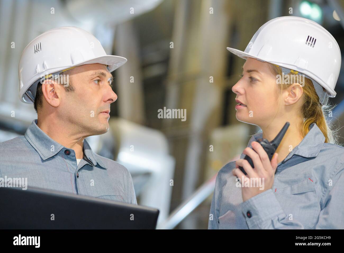 engineers working on construction site Stock Photo