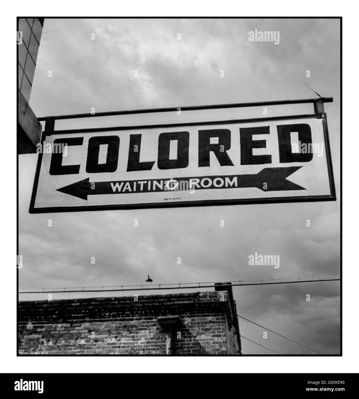 'COLORED' waiting room sign for Americans of colour Vintage 1940's Racist Racial Segregation Sign USA  A Greyhound bus trip from Louisville, Kentucky, to Memphis, Tennessee and the terminals. Sign at bus station. Rome, Georgia Stock Photo