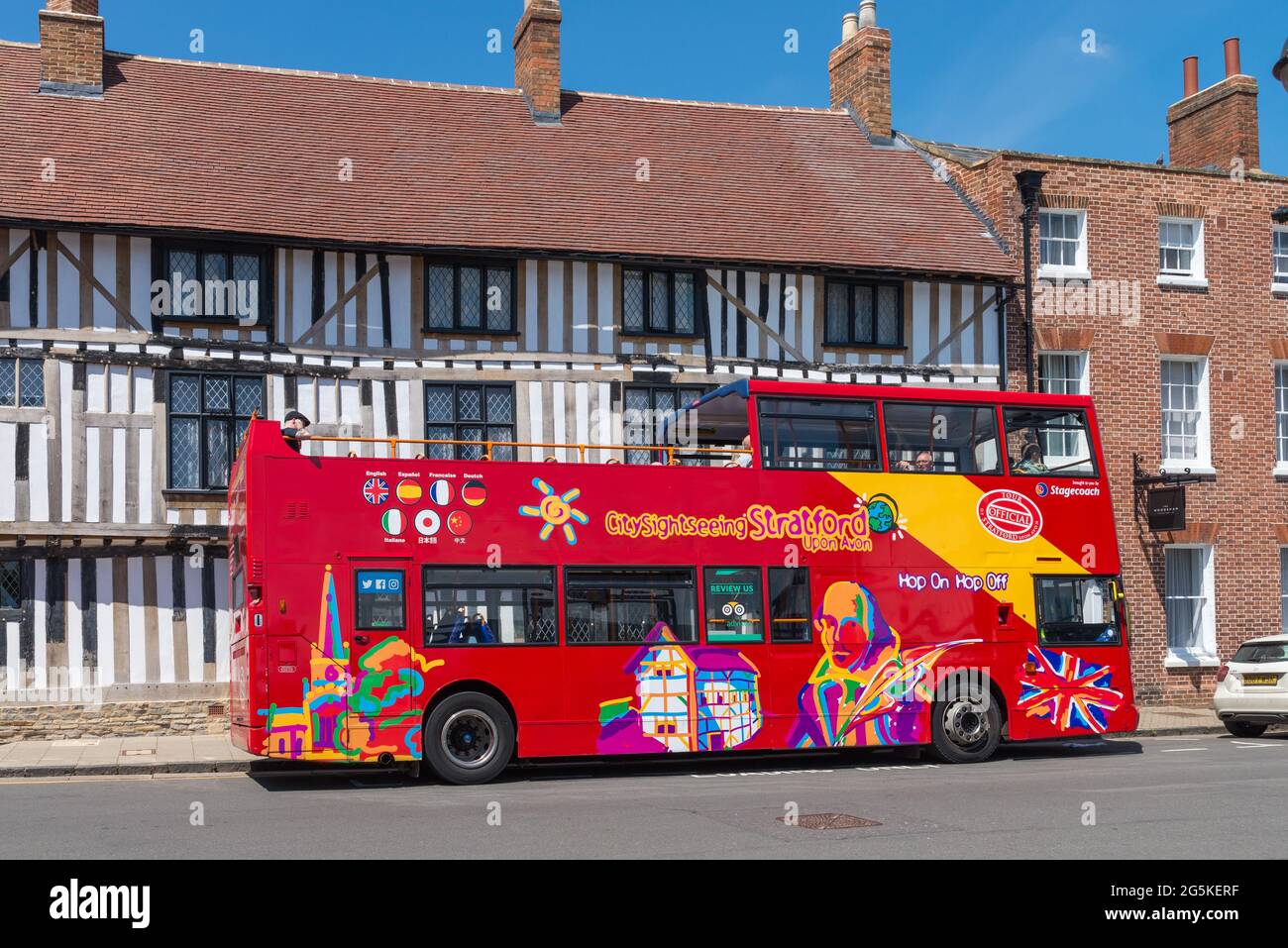 Open top hop-on hop-off double-decker sightseeing bus in Stratford-upon-Avon, Warwickshire Stock Photo