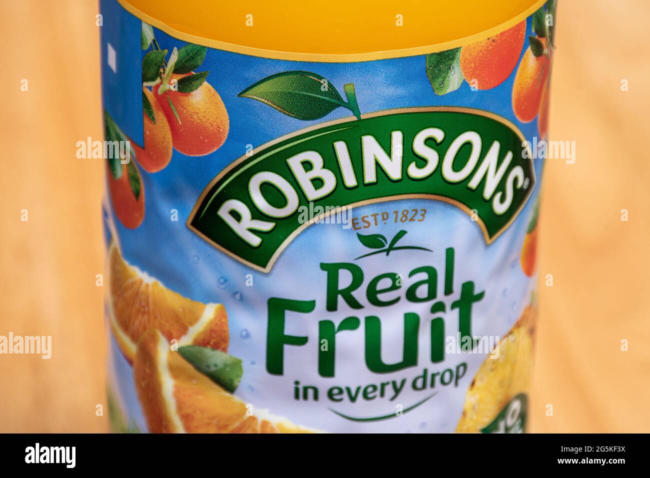 Bottle of Robinsons orange squash soft drink containing real fruit, UK Stock Photo