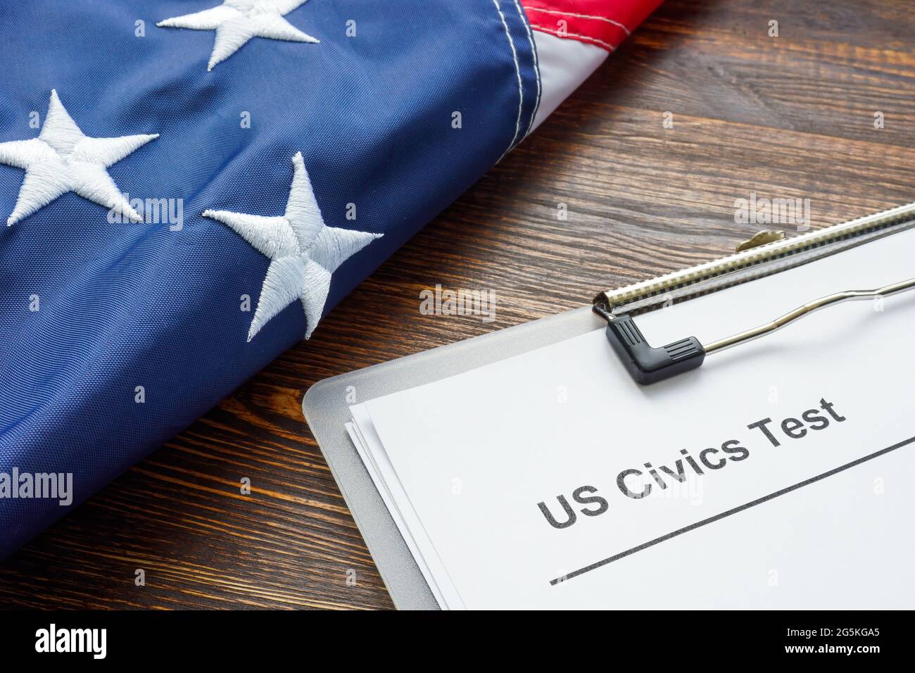US Civics test for citizenship and USA flag. Stock Photo